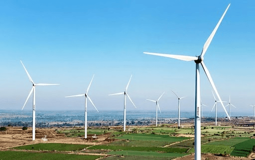 Wind turbine array on farmland, an Indian renewable energy carbon project